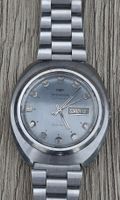 Technos Automatic with sunburst grey dial.25 jewels 1970's