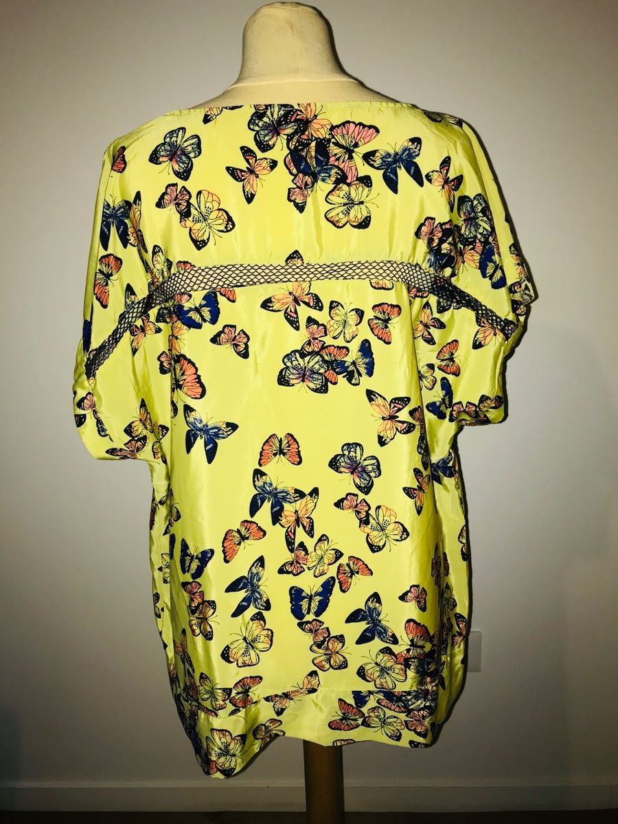 Top: Top jaune papillons Taille 48 – Nuovo (secondo la descrizione) da Lausanne venduto da Magic1900 1