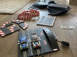 Carrera Digital 132 Autorennbahn mit Zubehör und Autos
