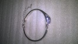 armreif,,metall,,silber farbe mit hellblau  kristall