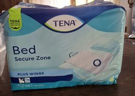 Bettschutz Tena Plus Wings