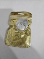 Bague adhésive metalique support main anneau argent