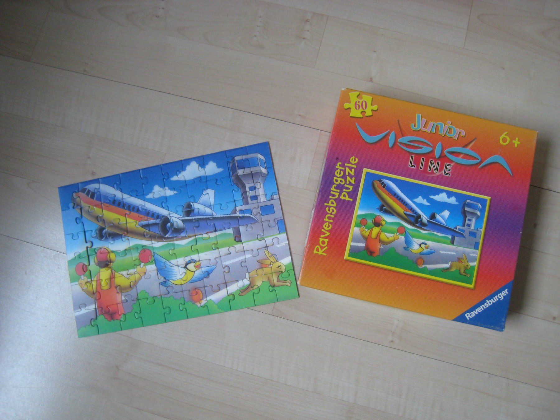 Ravensburger Puzzles: 60 Puzzle  Startendes Flugzeug  Junior Vision Line Hologramm – Gebraucht aus Dättlikon von Mamakuga