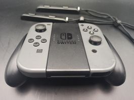 Original Nintendo Switch Joy-Con Set (Grau) + Grip / NSW