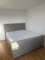 Bett grau 