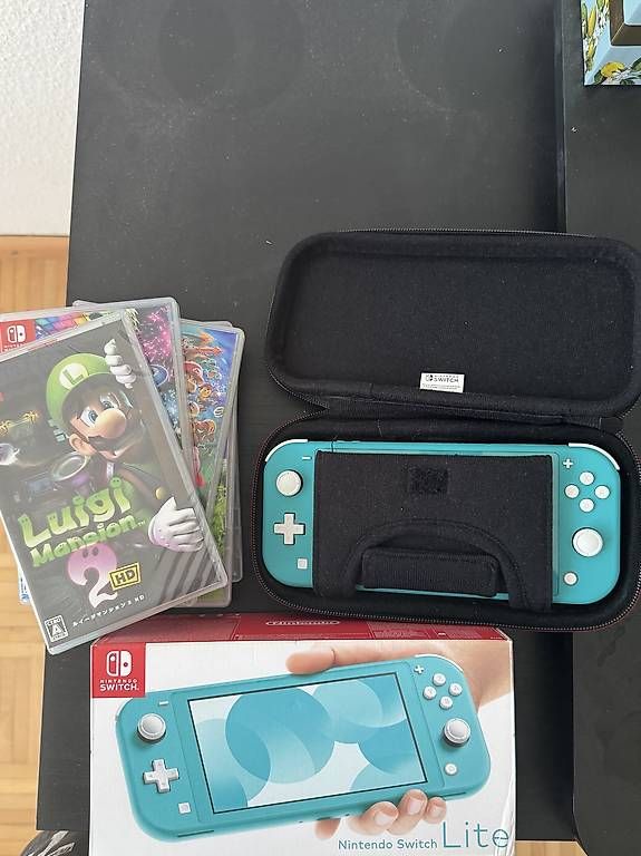 Nintendo Consoles: Nintendo Switch Lite Bundle + 7 Spiele + Reisetasche – D'occasion à Frenkendorf par BescheA