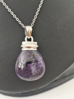 Très beau pendentif améthyste montée sur argent