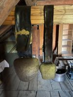 Alte Kuhglocke mit Lederriemen