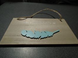 Holzschild mit der Aufschrift: Make Dreams Happen