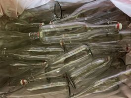 150 bouteilles en verre 1 litre avec mécanique, propres