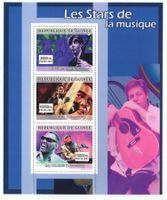 Block "Paul McCartney, Ray Charles". Guinea