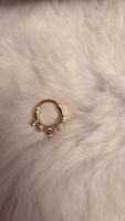 Septum goldfarbig mit Steinen