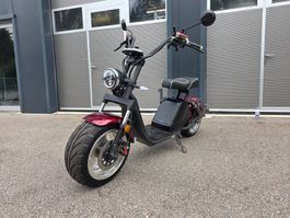 Elektro City-Roller rot schwarz gebrauchter Zustand