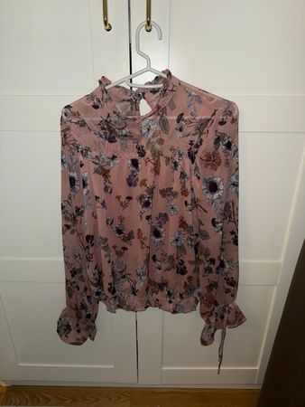 Schicke rosarote Bluse Gr. S