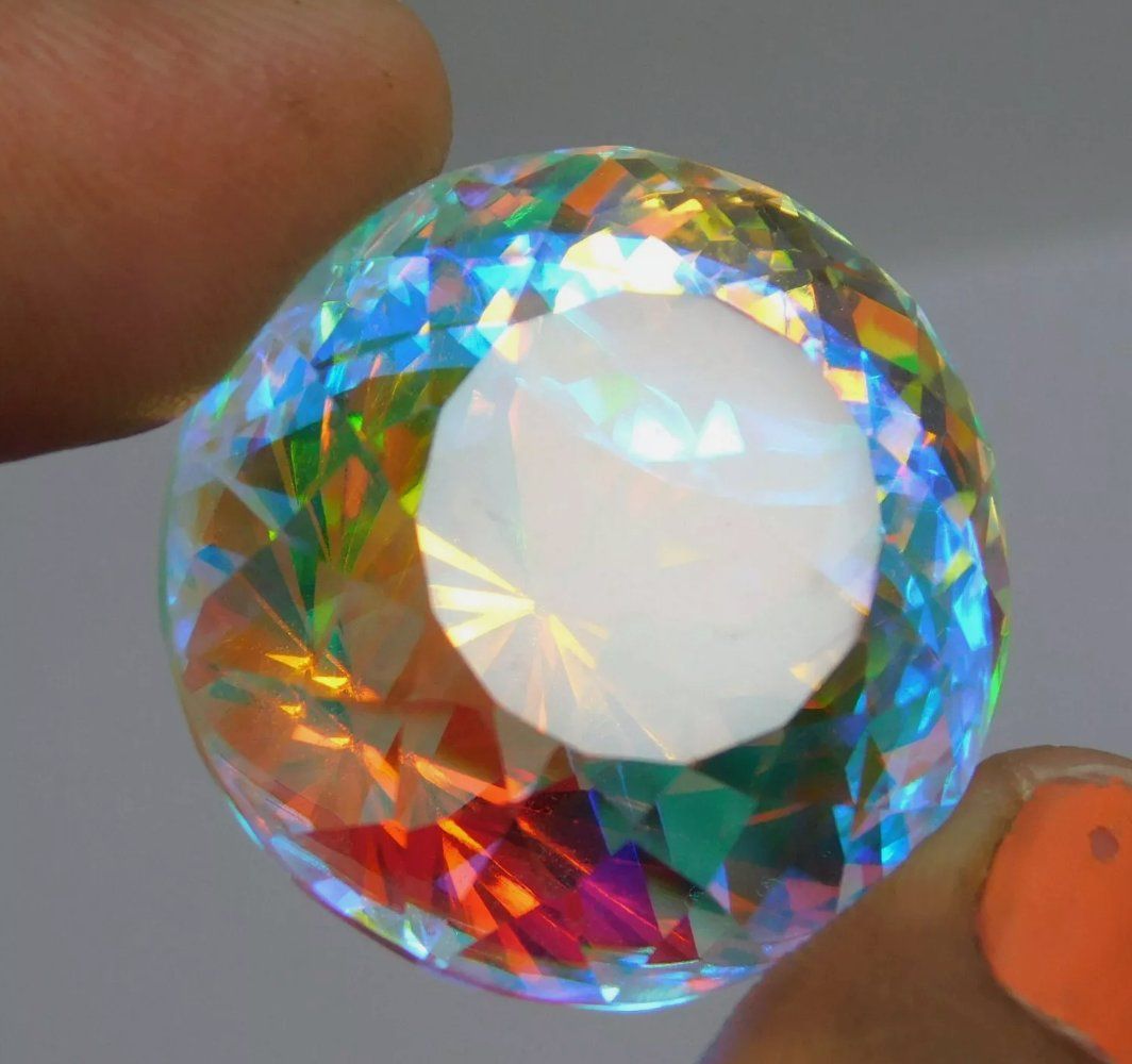 Pietre preziose: 56.1 Ct Mystic Certified – Nuovo e nell'imballaggio originale da Genève venduto da AWWA 2