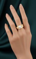 Bague dorée avec perle fine