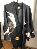 Asiatische bestickte Kleidung