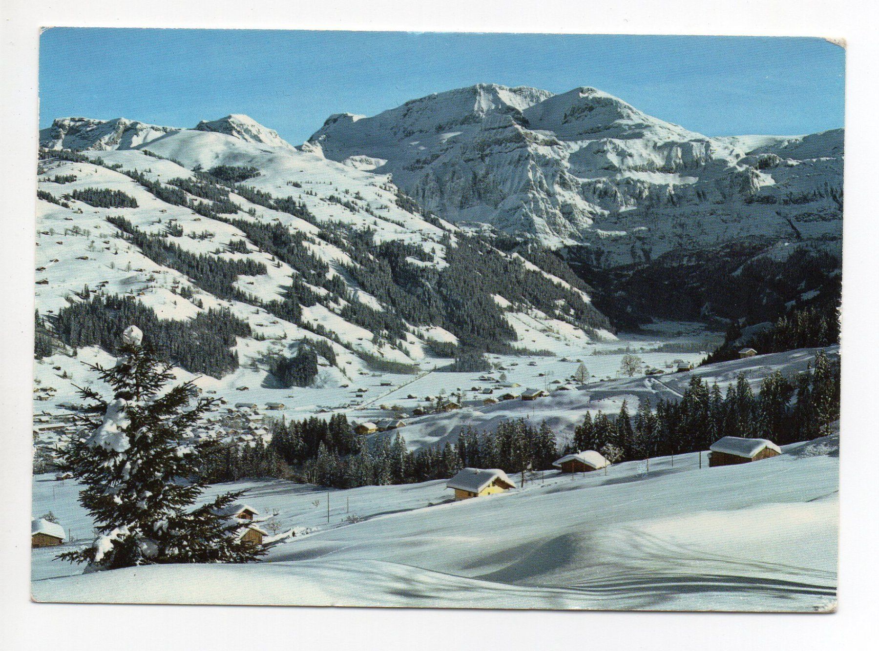 Cartoline postali: LENK i.S. - Dorf mit Wildstubel - Stempel Bahn MOB – Usato da Jona venduto da philajona