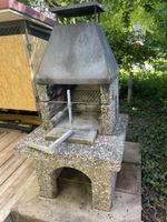 Cheminée mit schwenkbarem Grillrost