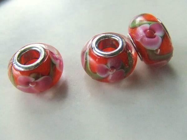 Perle (finte): Glasperle orange mit rosa Blüte  3D – Nuovo (secondo la descrizione) da Alpnachstad venduto da perlengaby