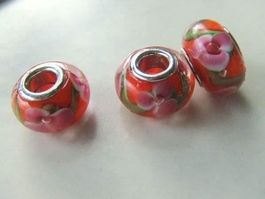 Glasperle orange mit rosa Blüte  3D