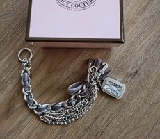 Montre bracelet Juicy Couture argentée avec charms 