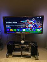 Meuble TV design, en métal et verre, comme neuf