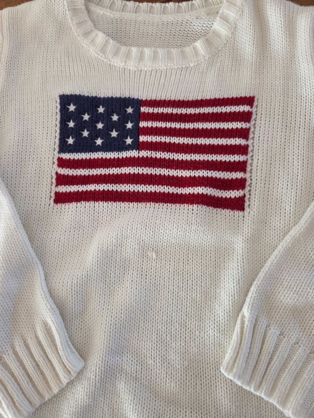 Maglioni & Felpe: Strickpullover weiss mit US-Flaggenmotiv – Usato da Oberiberg venduto da Dorimahei 1