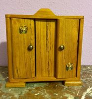 Armoire de poupées