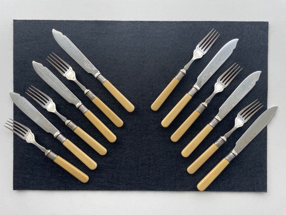 ensemble de 12 fourchettes à poisson vintage couvert