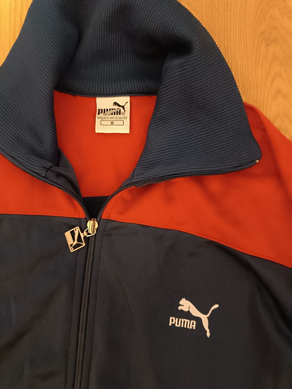 Puma Giacche: Puma Trainingsjacke Blau Orange Weiss Grösse L – Usato da Basel venduto da tracka 2