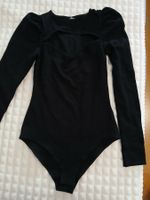 Schwarzer Body mit Puffärmeln und Cut-Outs Gr. XS