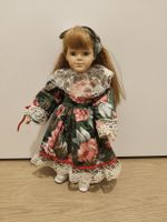 Poupée porcelaine