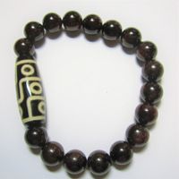 Edelstein Armband; Granat + tibetischer Dzi Stein