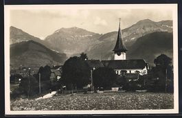 Aeschi, Teilansicht mit Kirche und Alpen