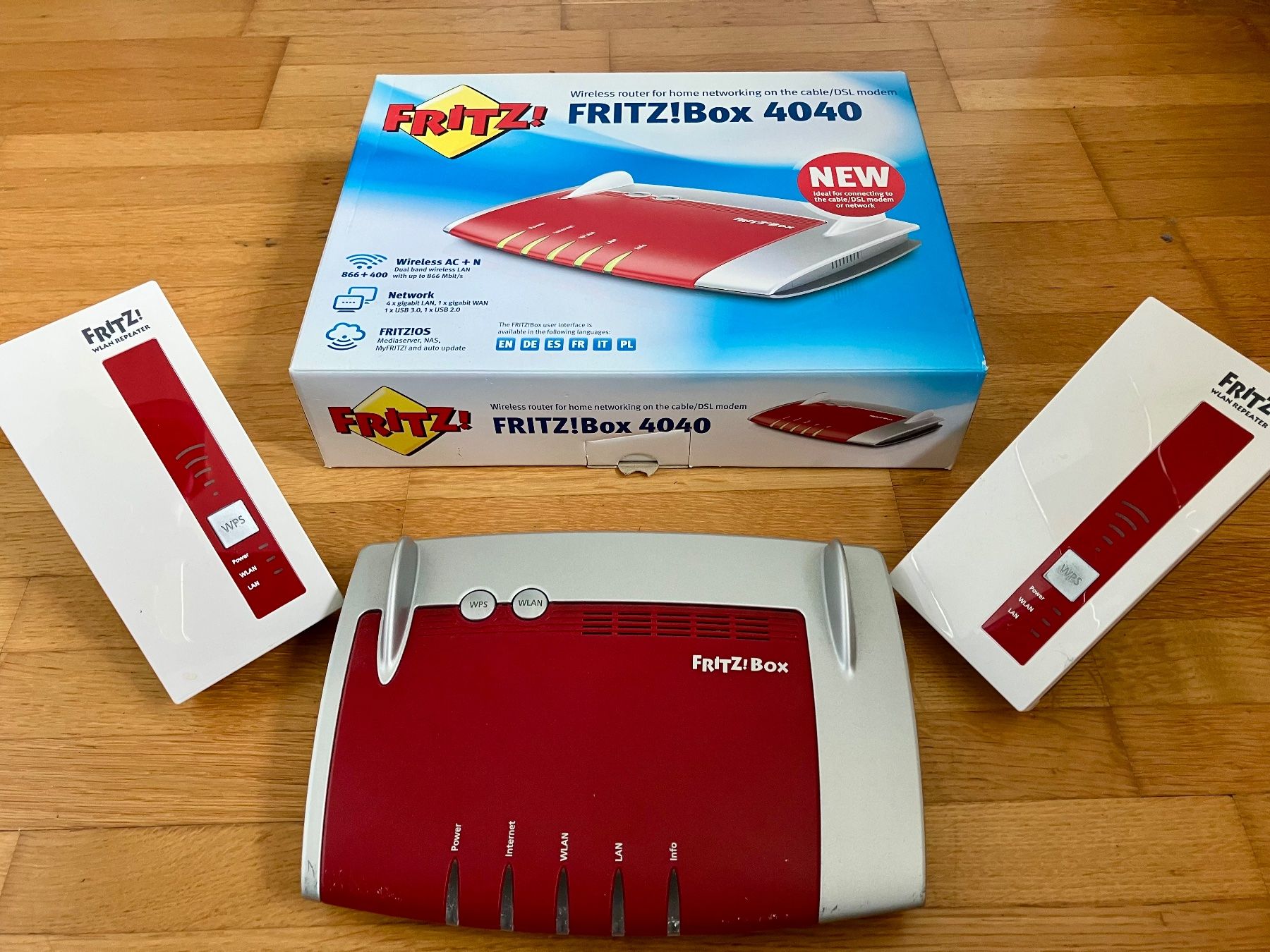 Fritz Modem & Router: FRITZ!Box 4040 inkl./Gratis 2x Repeater 1750E – Usato da Büren an der Aare venduto da Grux