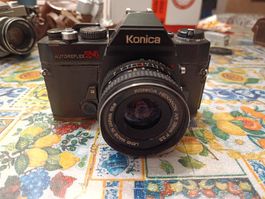 Konica Autoreflex T4 Camera with Hexanon AR 28mm F3.5 Lens