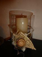 Deko-Glas mit Kerze und Steinen