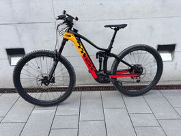Trek Rail 9.8XT Black/Marigold to red, S