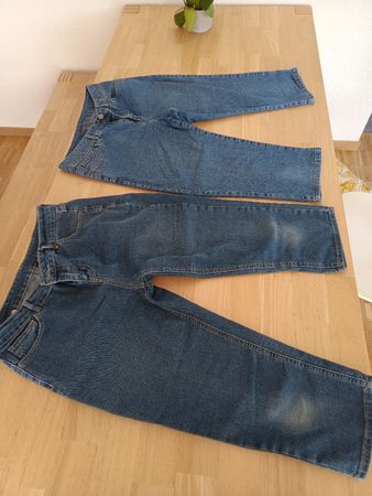 2 pantalons Jean mi-long
