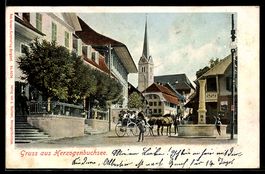 AK Herzogenbuchsee, Strassenszene mit Kirche, Brunnen und Pf