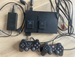 Playstation 2 Mini und Spiele