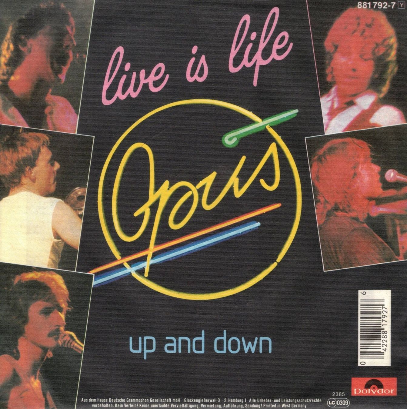 Dischi in vinile: Opus  --  Live is live  Single7 – Usato da Rheinau venduto da thespecials