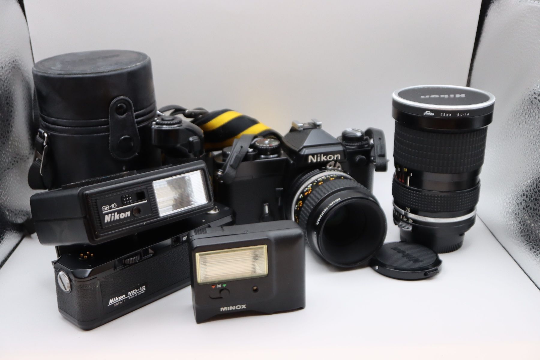 Nikon Kamera: Nikon FE Set mit 2 Nikkor Objektiven & Zubehör – Gebraucht aus Zürich von KE-Sales