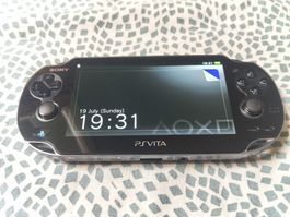 Sony PlayStation PSVita OLED PCH-1004 handheld console 