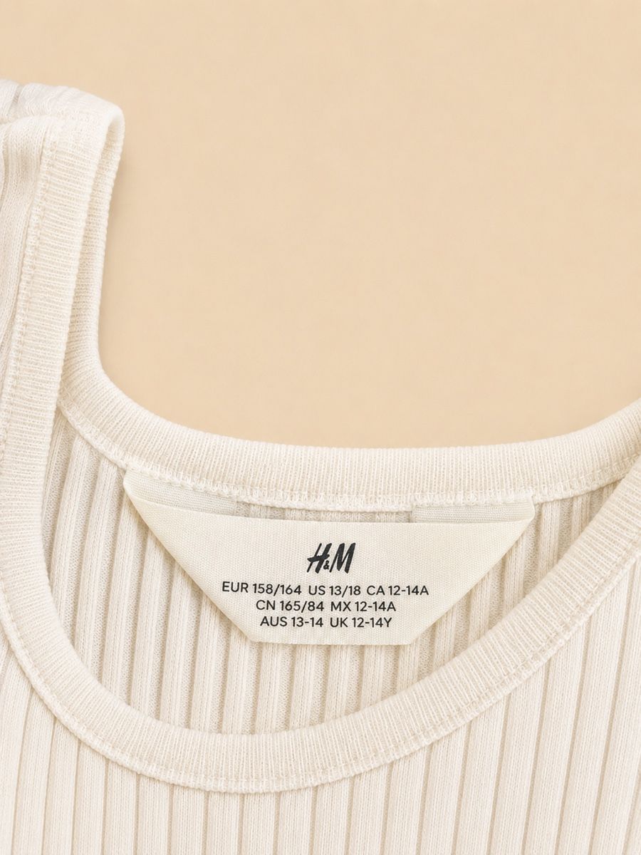 H&M Blouses, T-shirts & Tops: DÉBARDEUR CÔTELÉ CRÈME H&M – Neuf (Voir description) à Lausanne par mar_6snp 2