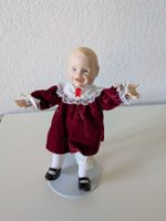 Kleine Porzellankopfpuppe