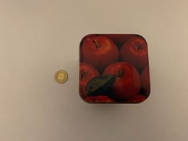 Dose mit Äpfelbild
