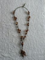 Lange Kette braun mit Perlen und Anhänger Modeschmuck 