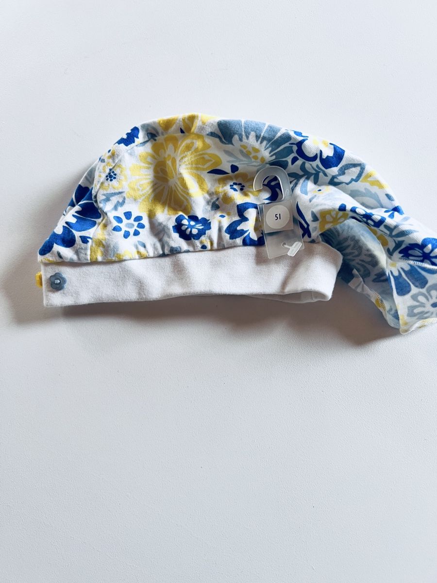 Altro abbigliamento per bambino: Blumenmütze Gr. 51, 80-86, neu – Nuovo e nell'imballaggio originale da Teufen AR venduto da Maleaa